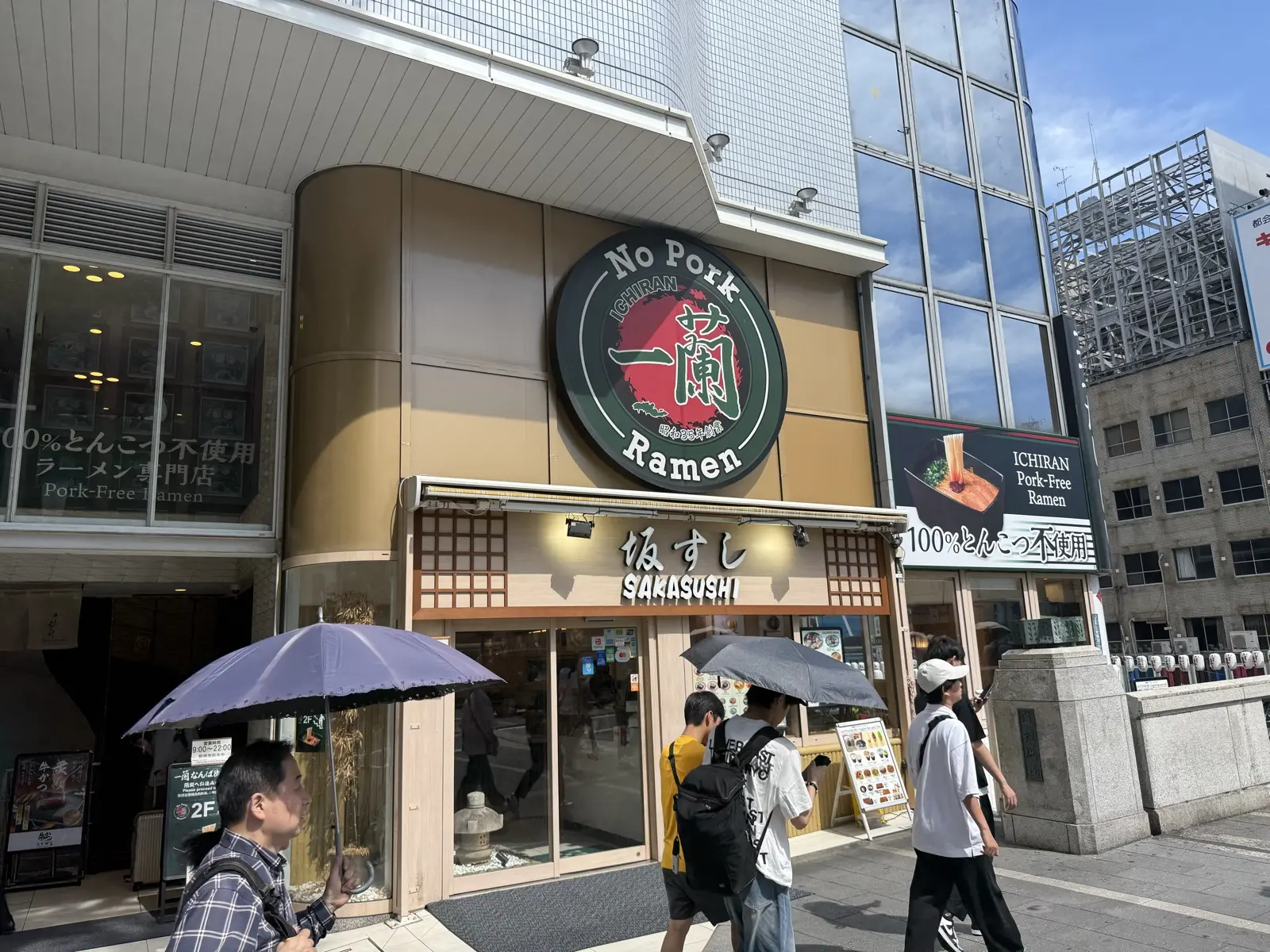 An Ichiran ramen branch near Namba, Osaka, with a round sign reading No Pork Ramen above the entrance