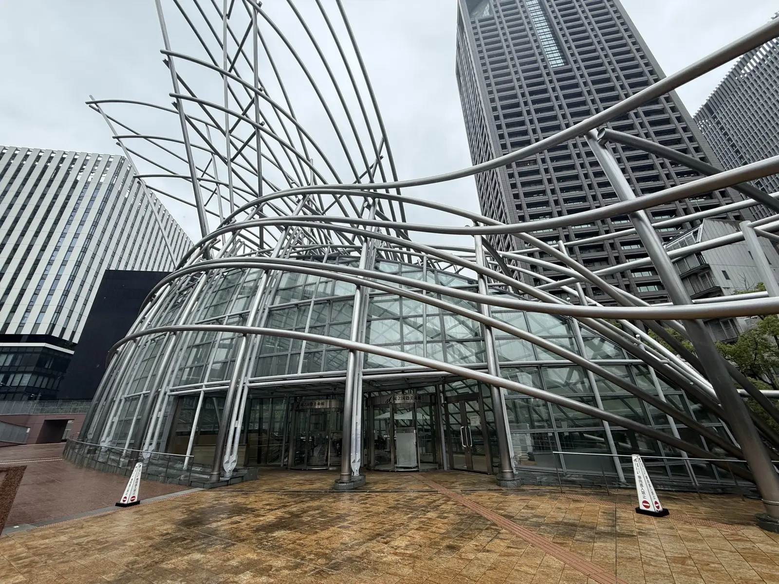 The National Museum of Art Osaka, its silver steel-tube facade over the glass entrance