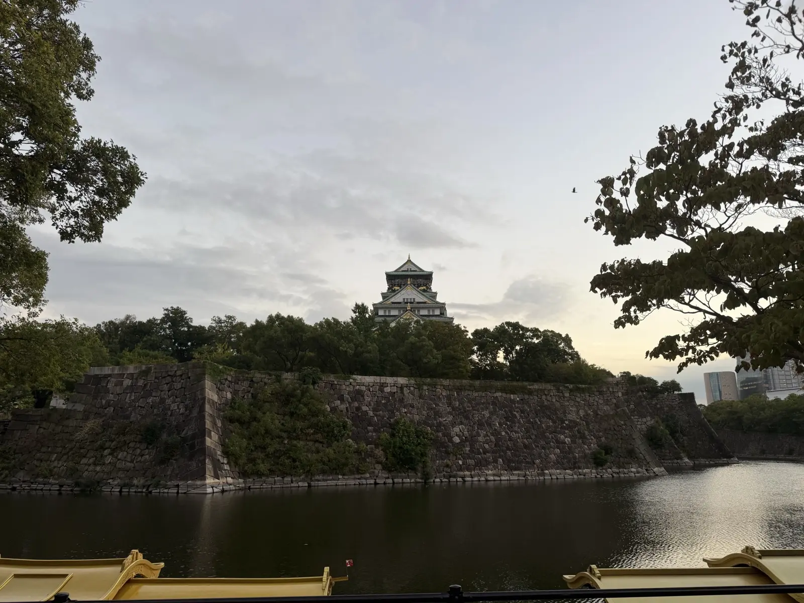 Osaka Castle moat with a sightseeing boat